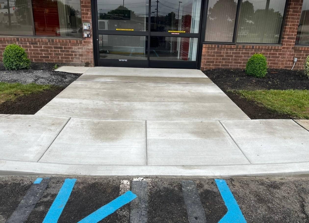 New commercial entrance walkway after pour by MJS & Sons Construction