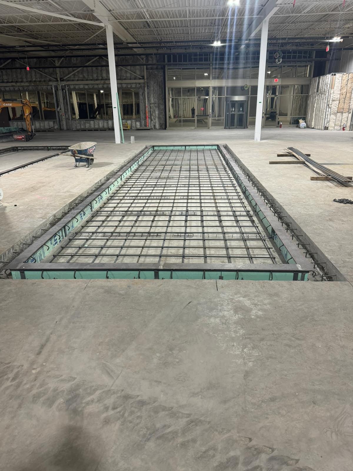 Wide reinforced equipment pit formed by MJS & Sons Construction