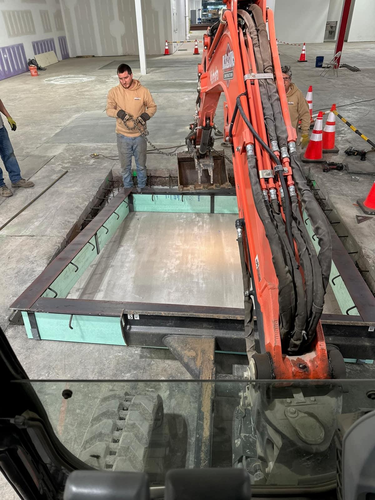 Steel cover frame set over the finished foundation by MJS & Sons Construction