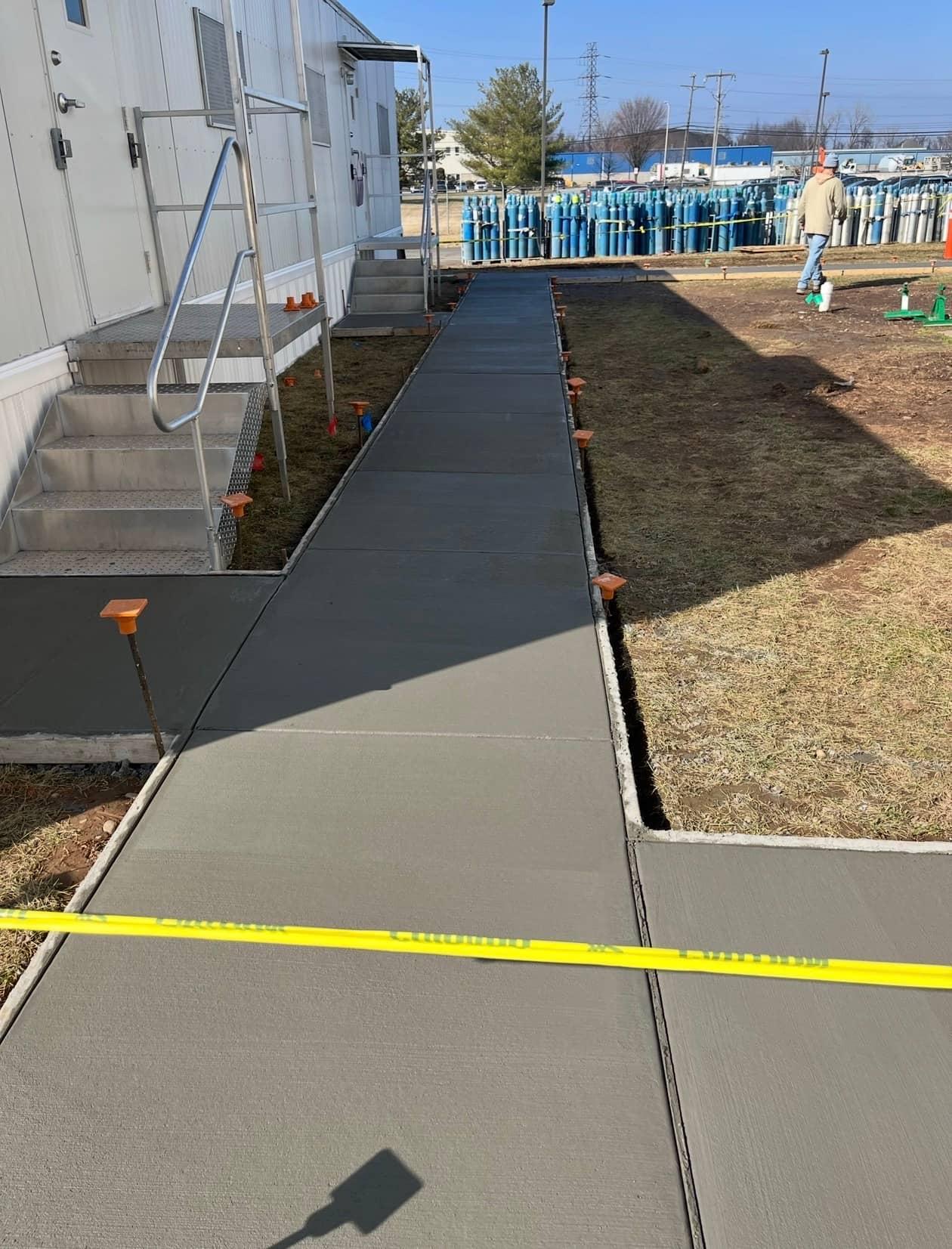 Industrial walkway fresh pour trailer by MJS & Sons Construction
