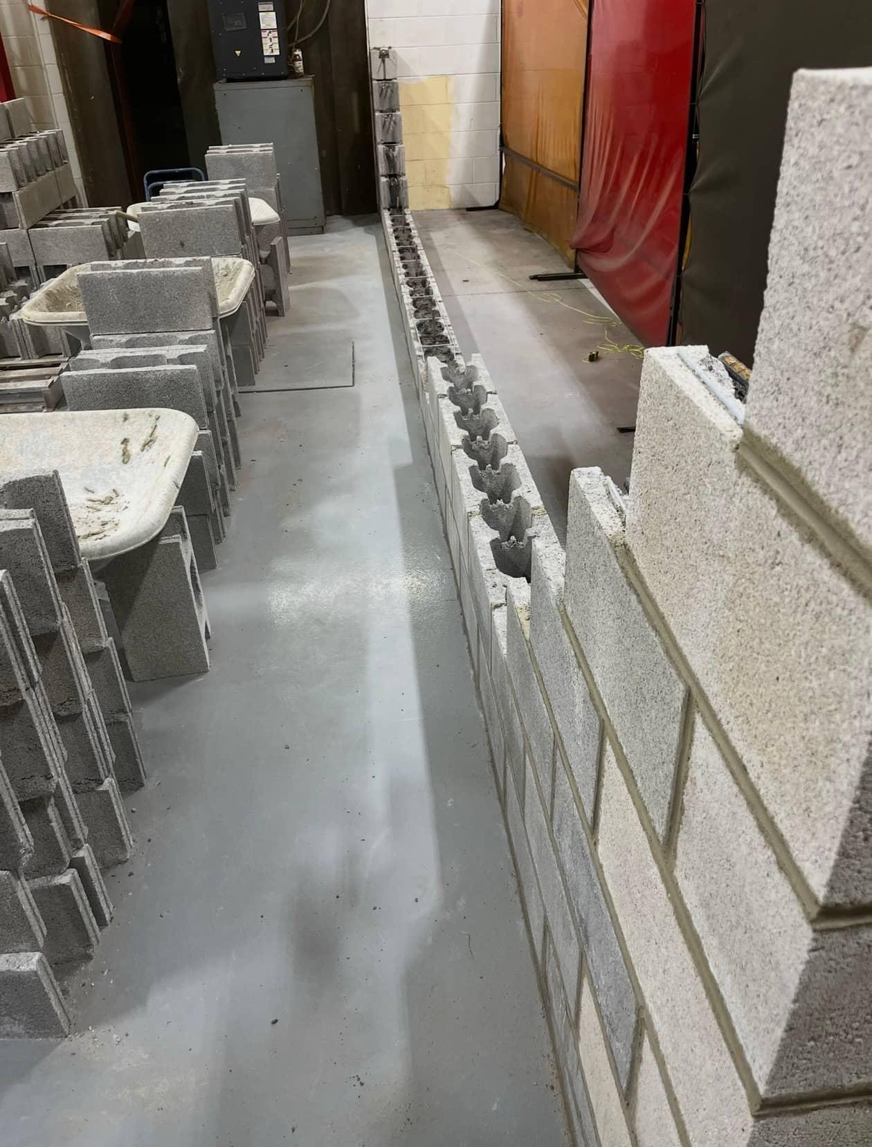 Interior block wall staged courses by MJS & Sons Construction