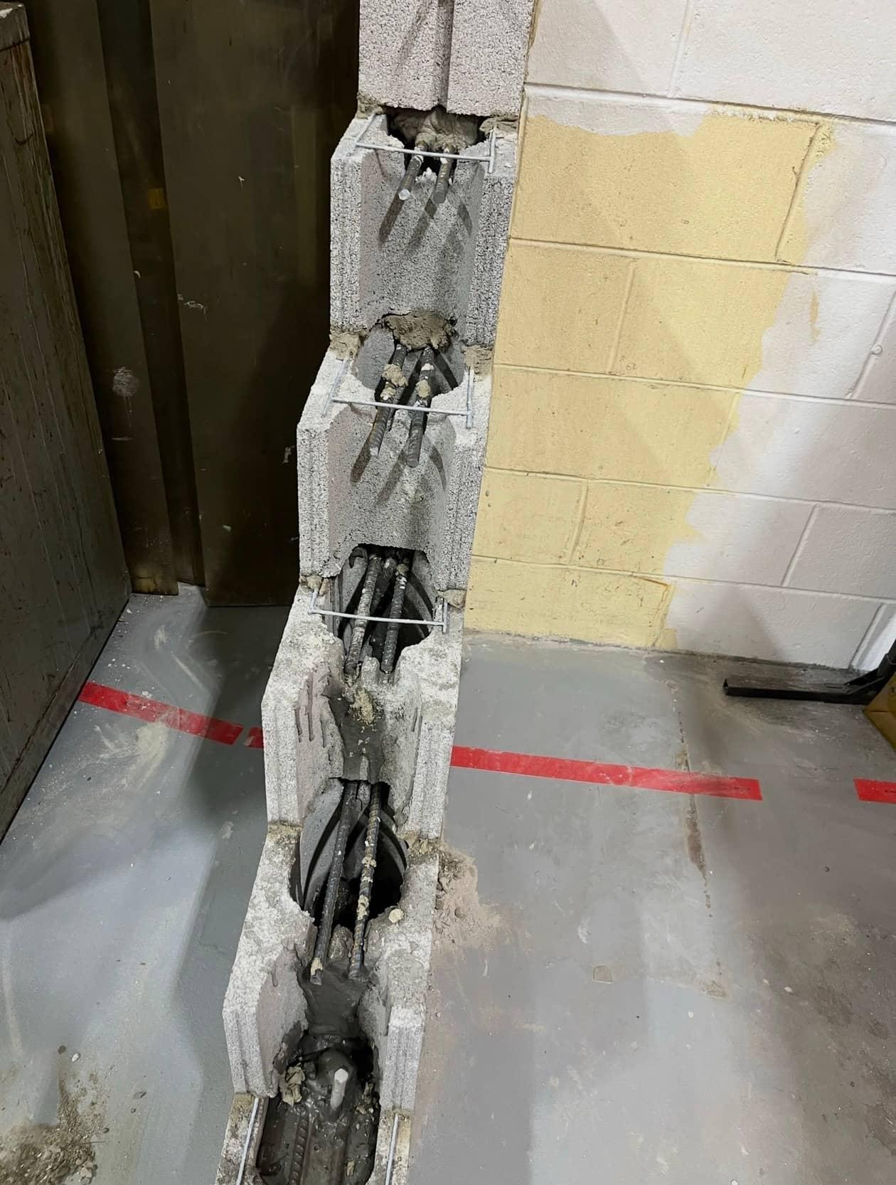 Reinforced block rebar grout detail by MJS & Sons Construction